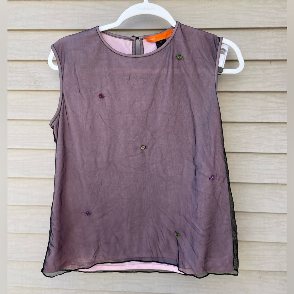 Pink tank top with mesh overlay and embellished with little lady bugs